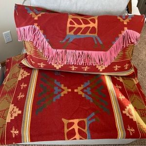 King size, custom made bedspread and 2 pillow shams with leather fringe.